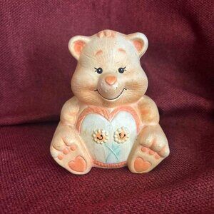 Cute vintage ceramic bear with heart and flowers